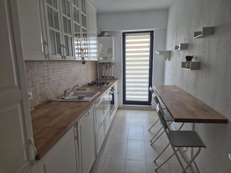 Lacul Morii apartament 2 camenre de inchiriat cu parcare, aer conditionat, centrala proprie